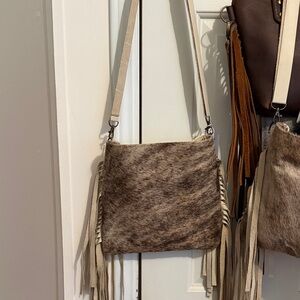 Elegant Tan and Cream Crossbody Bag with Fringe